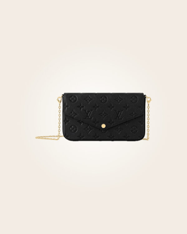 Louis Vuitton - Bolsa negra con dorado