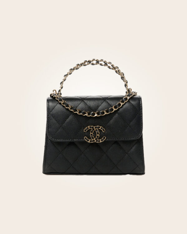 Chanel - Bolsa negra con dorado