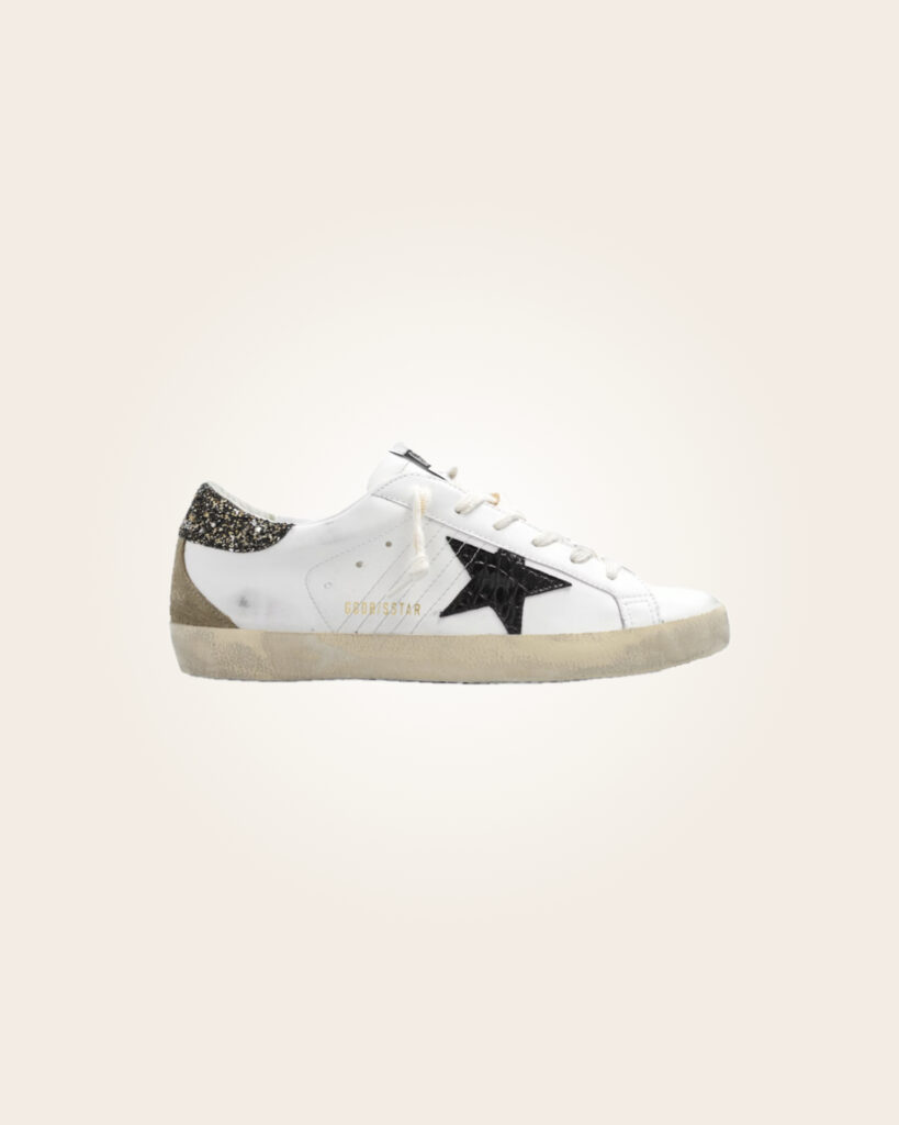 Golden Goose - Sneakers blancos con estrella negra y talón purpurina gris